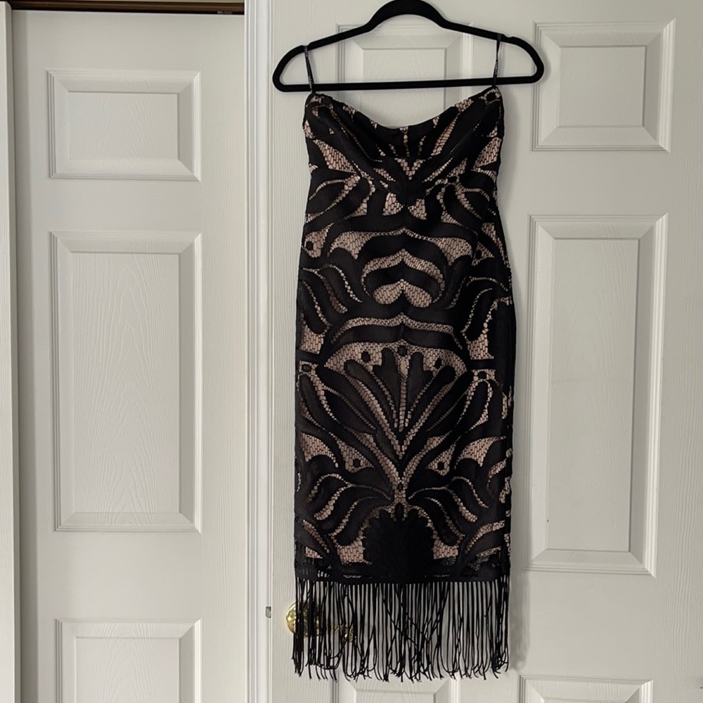 Strapless black lace dress with fringe detail